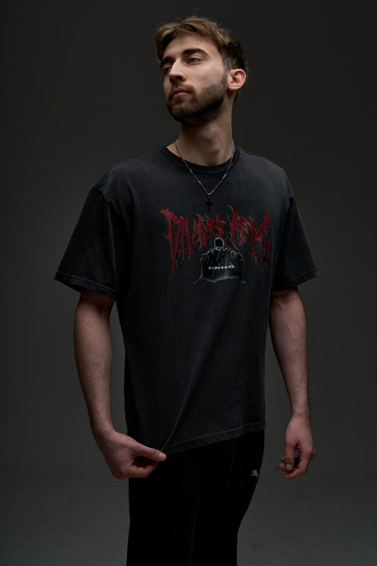 Model wearing the washed black Guts Dark Edition tee - front view with red Divine Reps chest logo