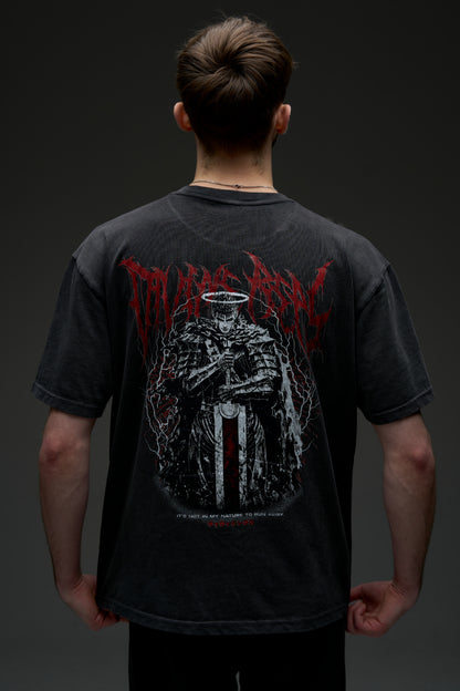 Model wearing the washed black Guts Dark Edition tee - back view with large armored warrior print