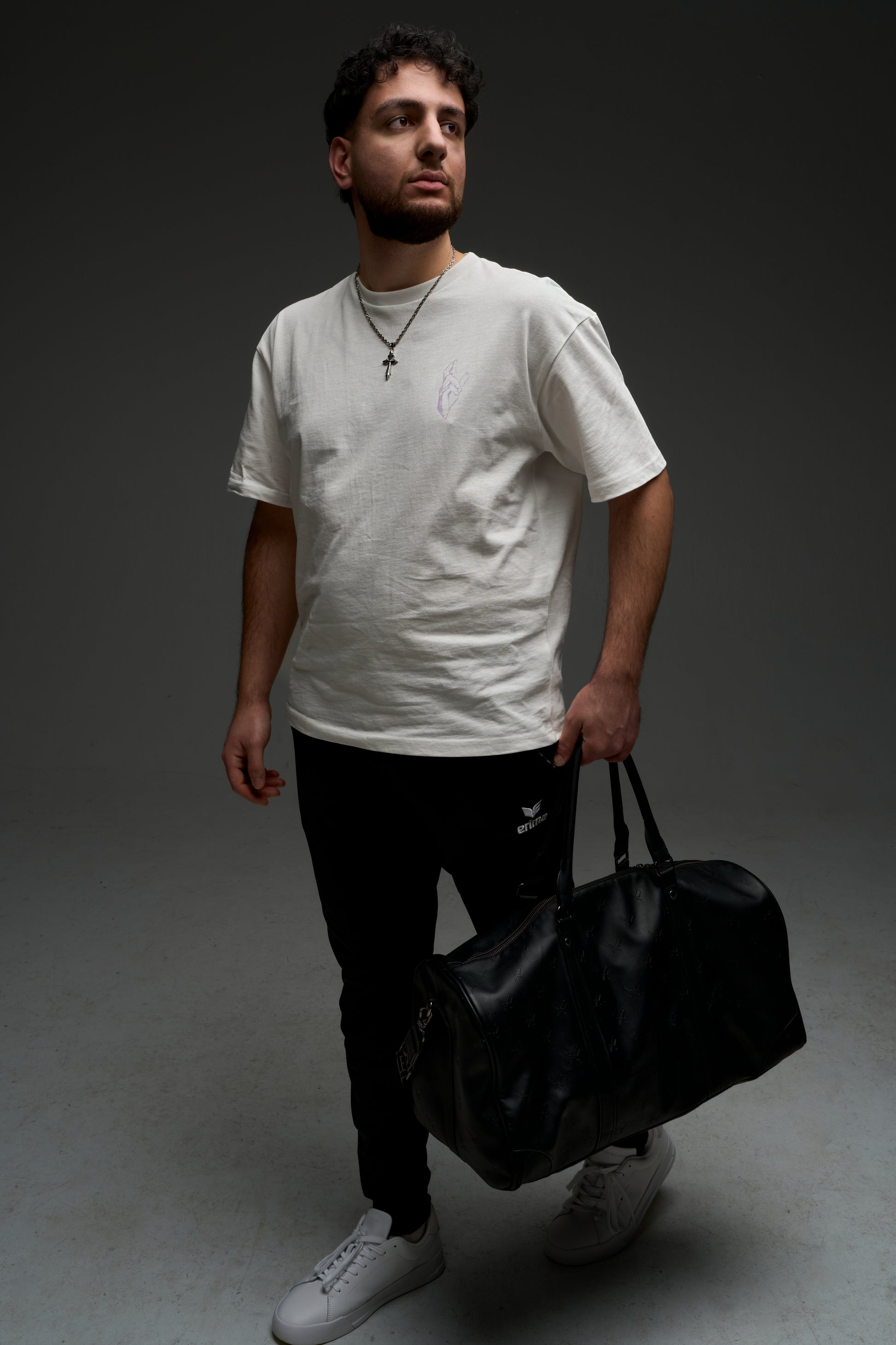 Model wearing the natural raw Hollow Purple armor tee - full body front view, oversized drop-shoulder fit