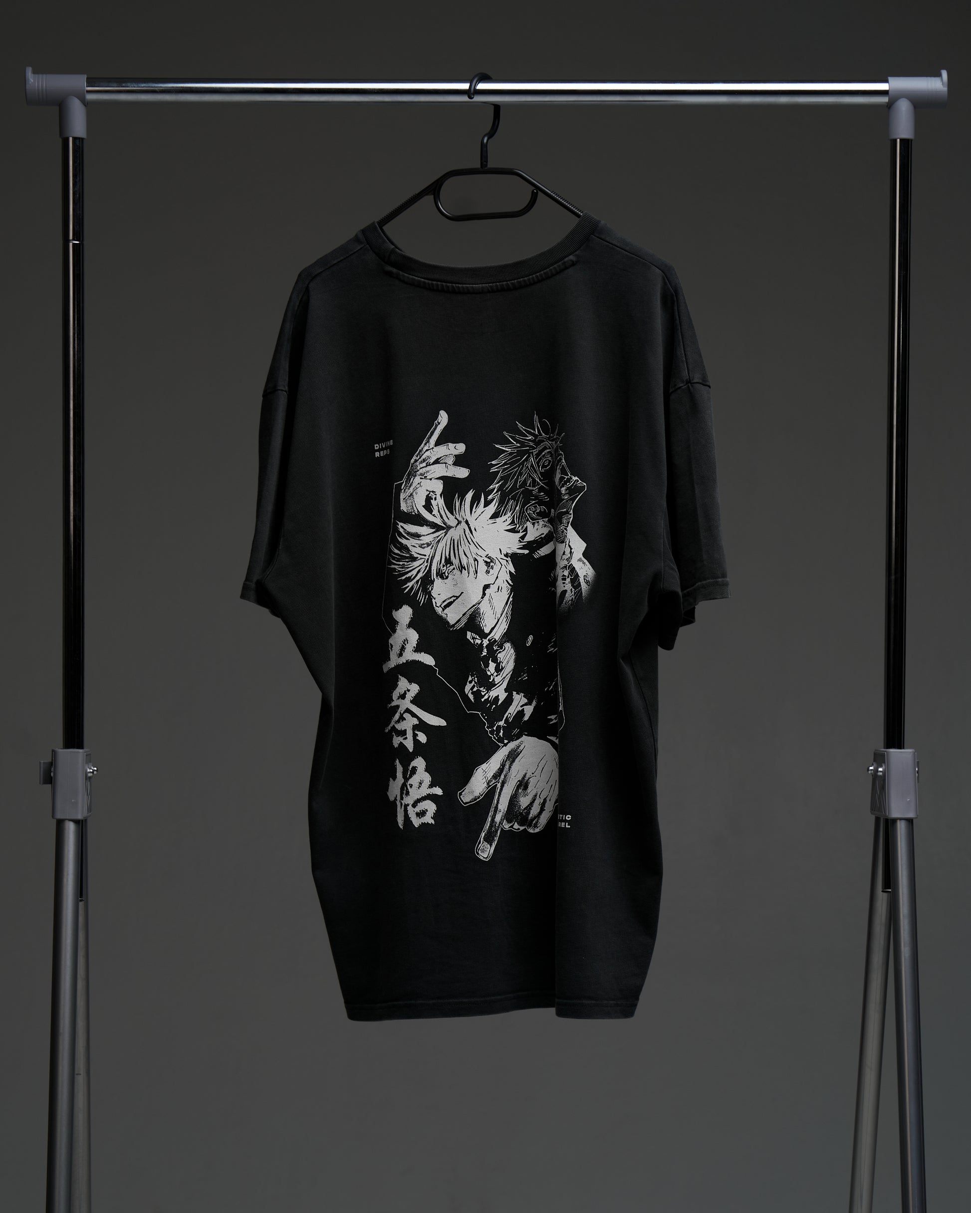 Black Gojo armor tee on a rack - back view with large monochrome character print and kanji