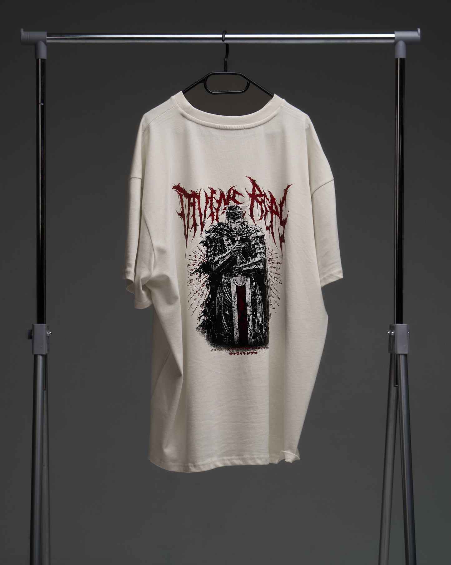 Natural raw Guts armor tee on a rack - back view with large armored warrior print