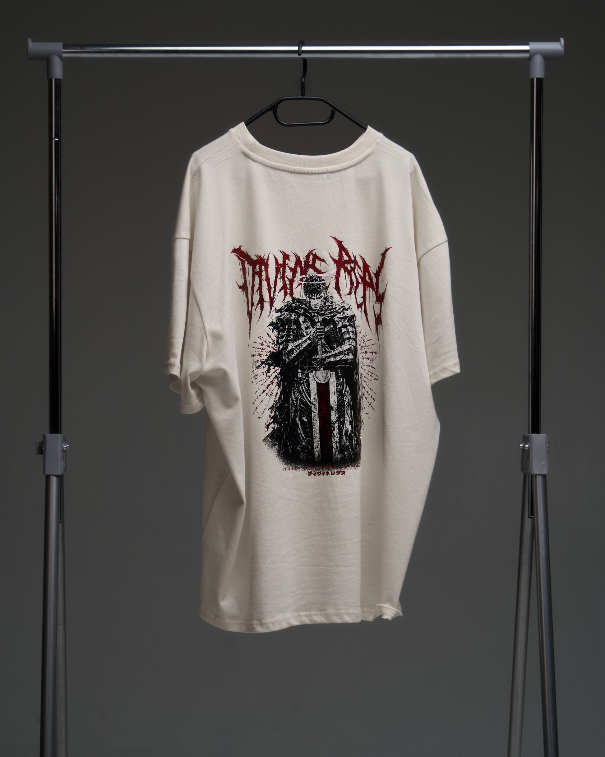 Natural raw Guts armor tee on a rack - back view with large armored warrior print